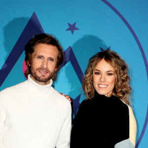 Philippe Lacheau et Elodie Fontan au photocall de la soirée d'ouverture de la 25ème édition du Festival international du film de comédie de l'Alpe d'Huez le 17 janvier 2022. © Dominique Jacovides / Bestimage 