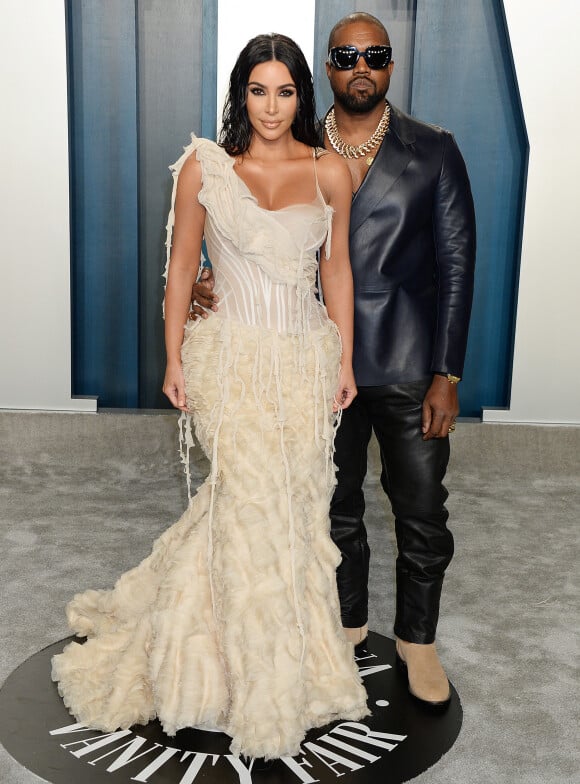 Kim Kardashian et son mari Kanye West à la soirée "Vanity Fair Oscar Party" après la 92e cérémonie des Oscars