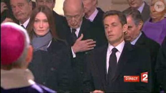 Nicolas Sarkozy et Carla Bruni à l'enterrement de Philippe Séguin en l'église Saint-Louis-des-Invalides. 11 janvier 2010