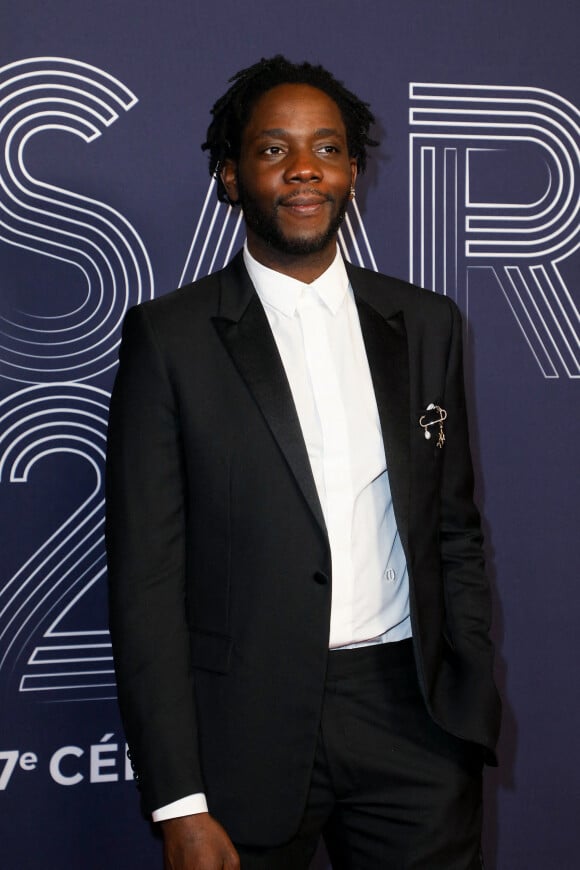 Makita Samba (habillé en Dior Homme et chaussures Weston) - Photocall de la 47ème édition de la cérémonie des César à l'Olympia à Paris, le 25 février 2022. © Borde-Jacovides/Bestimage 