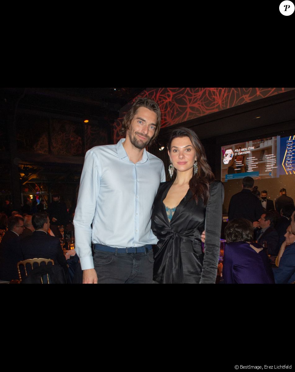 Exclusif - Le nageur Camille Lacourt et sa compagne Alice Detollenaere lors de la soirée de gala de l'Institut Rafaël, maison de l'après Cancer, au Pavillon Gabriel à Paris le 13 décembre 2021. © Erez Lichtfeld / Bestimage