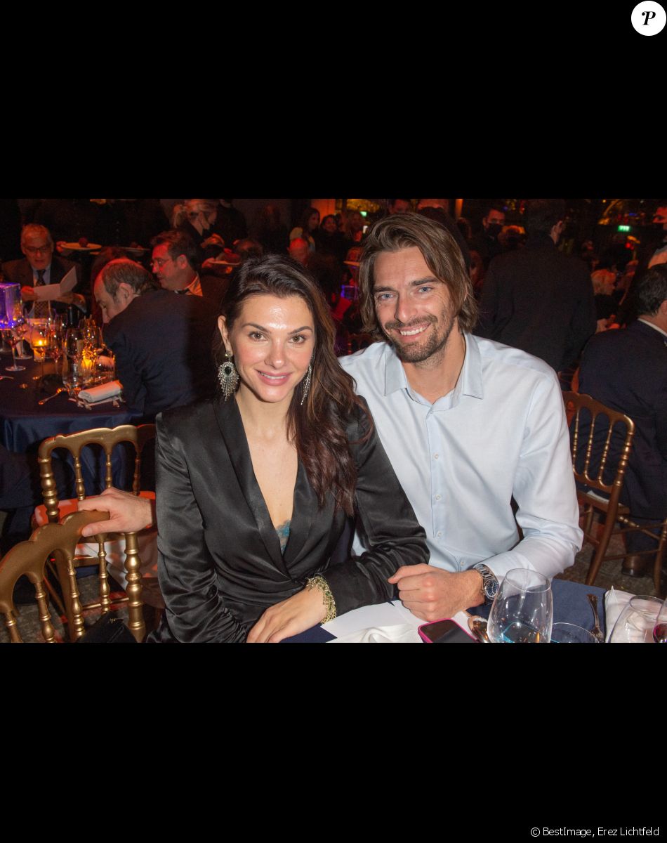 Exclusif - Le nageur Camille Lacourt et sa compagne Alice Detollenaere lors de la soirée de gala de l'Institut Rafaël, maison de l'après Cancer, au Pavillon Gabriel à Paris le 13 décembre 2021. © Erez Lichtfeld / Bestimage