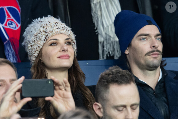 Camille Lacourt et sa compagne Alice Detollenaere (Miss Bourgogne 2010) dans les tribunes lors du match de championnat de Ligue 1 Conforama opposant le Paris Saint-Germain (PSG) aux Girondins de Bordeaux au Parc des Princes à Paris, France, le 23 février 2020. © Cyril Moreau/Bestimage