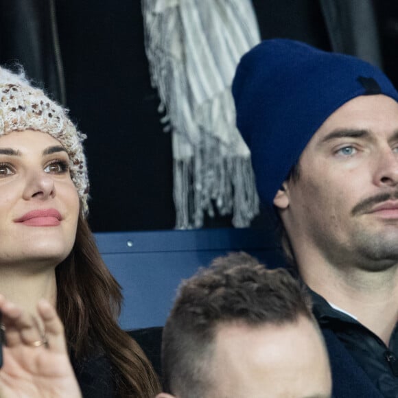 Camille Lacourt et sa compagne Alice Detollenaere (Miss Bourgogne 2010) dans les tribunes lors du match de championnat de Ligue 1 Conforama opposant le Paris Saint-Germain (PSG) aux Girondins de Bordeaux au Parc des Princes à Paris, France, le 23 février 2020. © Cyril Moreau/Bestimage