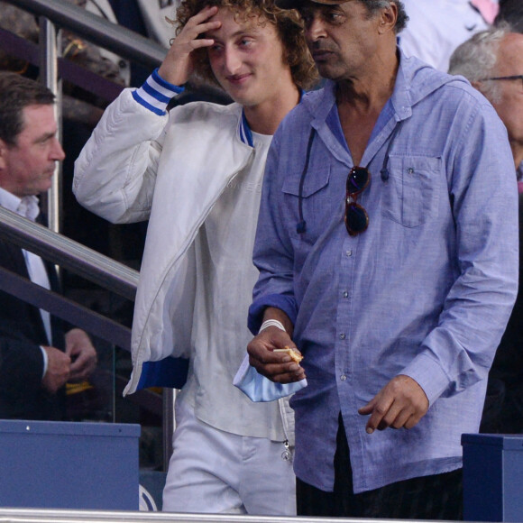 Yannick Noah et son fils Joalukas - People en tribunes du match de football en ligue 1 Uber Eats : Le PSG (Paris Saint-Germain) remporte la victoire 2-1 contre Lyon au Parc des Princes à Paris le 19 septembre 2021. 