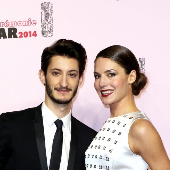 Pierre Niney et sa compagne Natasha Andrews - Arrivées Exterieur - 39ème cérémonie des Cesar au théâtre du Châtelet à Paris Le 28 Février 2014  Arrivals at 39th Cesar ceremony (French movie awards) at Theatre du chatelet in Paris, France, on February, 28th 2014. 