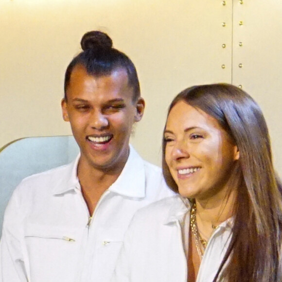 Stromae et sa femme Coralie Barbier (enceinte) présentent au Bon Marché la 5e collection de vêtements de leur marque Moseart. Le 6 avril 2018.
