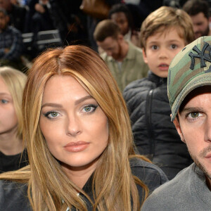 Caroline Receveur et Hugo Philip au match de NBA Game Paris 2020 entre les Bucks de Milwaukee et les Charlotte Hornet à l'AccorHotels Arena à Paris le 24 janvier 2020. © Veeren / Bestimage 