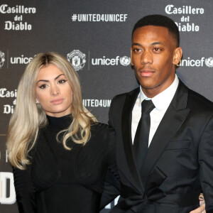 Anthony Martial et sa compagne Mélanie Da Cruz lors du dîner de gala "United For Unicef" à Manchester. 