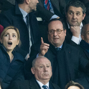 François Hollande et sa compagne Julie Gayet lors du tournoi des six nations de rugby, la France contre l'Angleterre au Stade de France à Saint-Denis, Seine Saint-Denis, France, le 10 mars 2018.