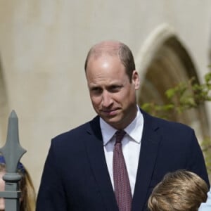 Le prince William, duc de Cambridge, et Catherine (Kate) Middleton, duchesse de Cambridge, Le prince George de Cambridge, La princesse Charlotte de Cambridge - La famille royale britannique quitte la chapelle Saint-Georges de Windsor après la messe de Pâques, le 17 avril 2022. 