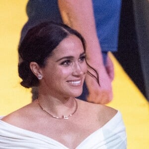 Le prince Harry et Meghan Markle lors de la cérémonie d'ouverture des Invictus Games 2020 à La Haye, le 16 avril 2022.