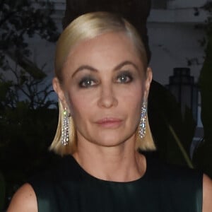 Emmanuelle Beart arrive au dîner "Chopard" lors du 74ème Festival International du Film de Cannes, le 15 juillet 2021. 