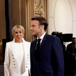 Emmanuel Macron et la première dame Brigitte Macron - Cérémonie d'investiture du président de la République, au Palais de l'Elysée à Paris suite à sa réélection.