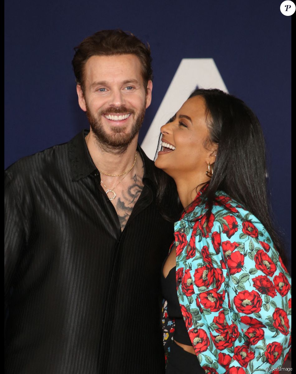 Matt Pokora et sa femme Christina Milian au photocall lors de la première du film "Ambulance" à Los Angeles