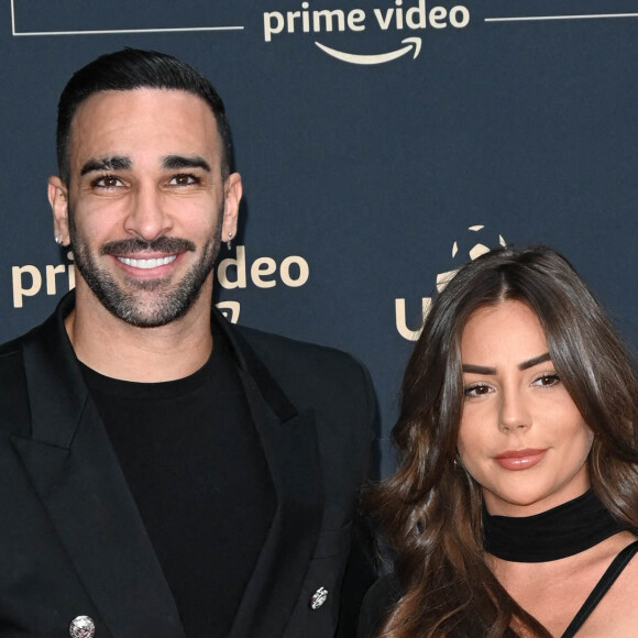 Adil Rami et sa compagne Léna Guillou - Photocall de la cérémonie des Trophées UNFP 2022 au Pavillon Gabriel à Paris le 15 mai 2022. © Coadic Guirec/Bestimage