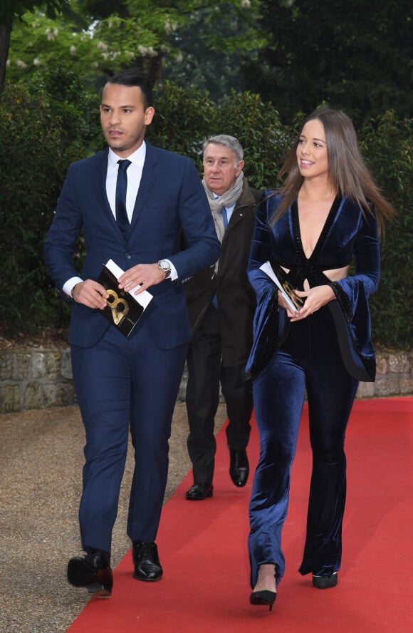 Mohamed Bouhafsi et sa compagne Angéline arrivent à la 28ème cérémonie des trophées UNFP (Union nationale des footballeurs professionnels) au Pavillon d'Armenonville à Paris, France, le 19 mai 2019
