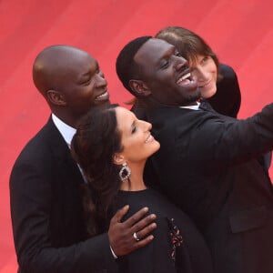 Alassane Diong, Omar Sy et sa femme Hélène - Montée des marches du film " Top Gun : Maverick " lors du 75ème Festival International du Film de Cannes. Le 18 mai 2022 © Giancarlo Gorassini / Bestimage 