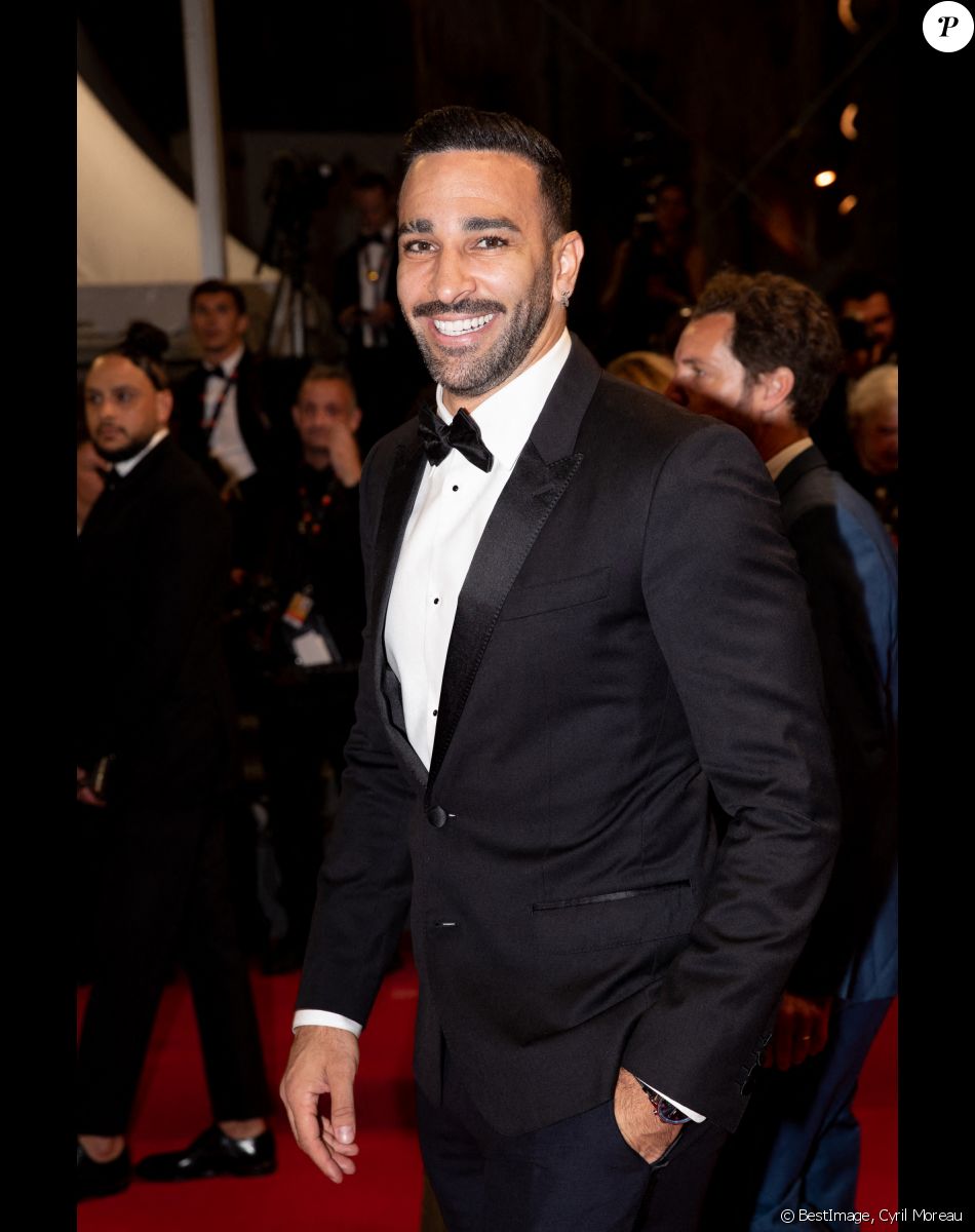 Adil Rami - Montée des marches du film "Novembre" lors du 75ème Festival International du Film de Cannes, le 22 mai 2022. © Cyril Moreau / Bestimage