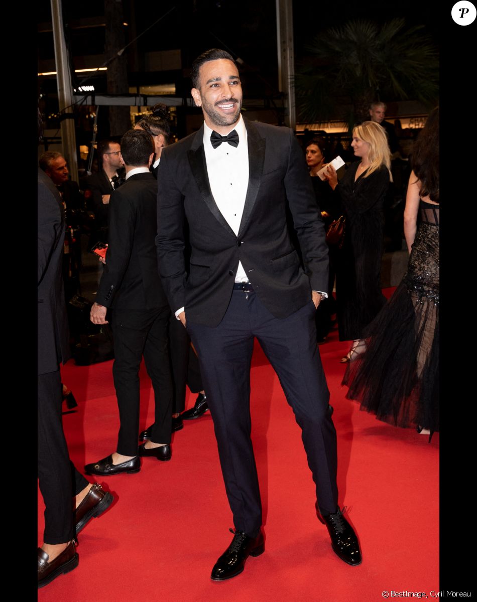 Adil Rami - Montée des marches du film "Novembre" lors du 75ème Festival International du Film de Cannes, le 22 mai 2022. © Cyril Moreau / Bestimage