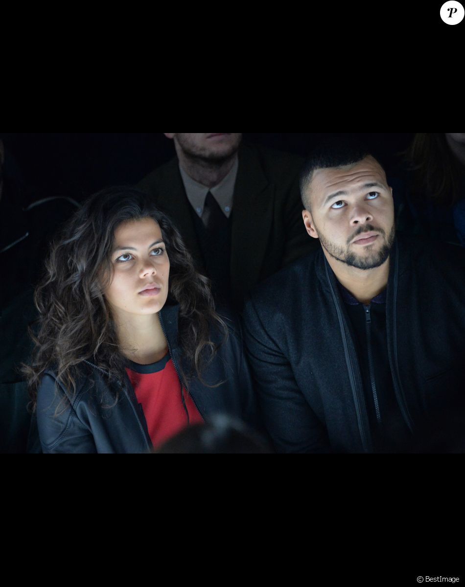 Jo-Wilfried Tsonga et sa compagne Noura au défilé de mode hommes Y-3 collection prêt-à-porter Automne Hiver au Couvent des Cordeliers à Paris.