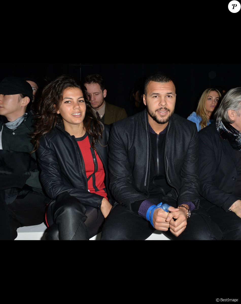 Jo-Wilfried Tsonga et sa compagne Noura au défilé de mode hommes Y-3 collection prêt-à-porter Automne Hiver 2015/2016 au Couvent des Cordeliers à Paris, le 25 janvier 2015.