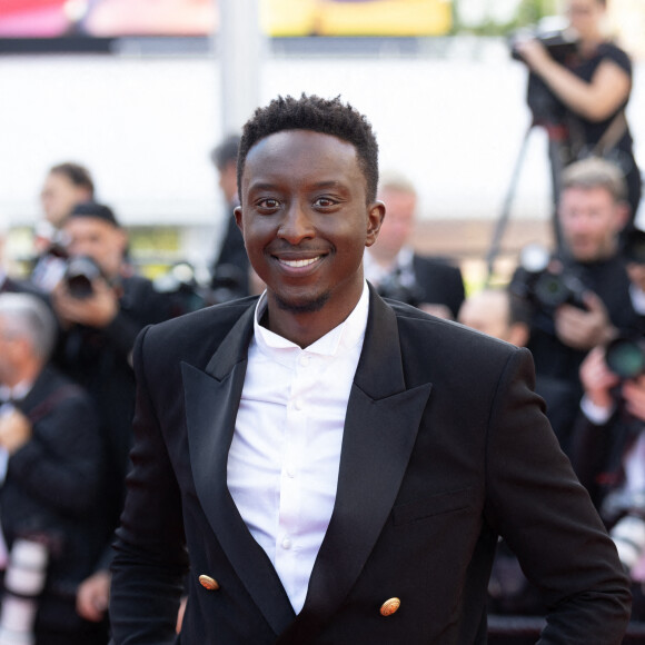 Ahmed Sylla - Montée des marches du film " Un petit frère " lors du 75ème Festival International du Film de Cannes. Le 27 mai 2022 © Cyril Moreau / Bestimage
