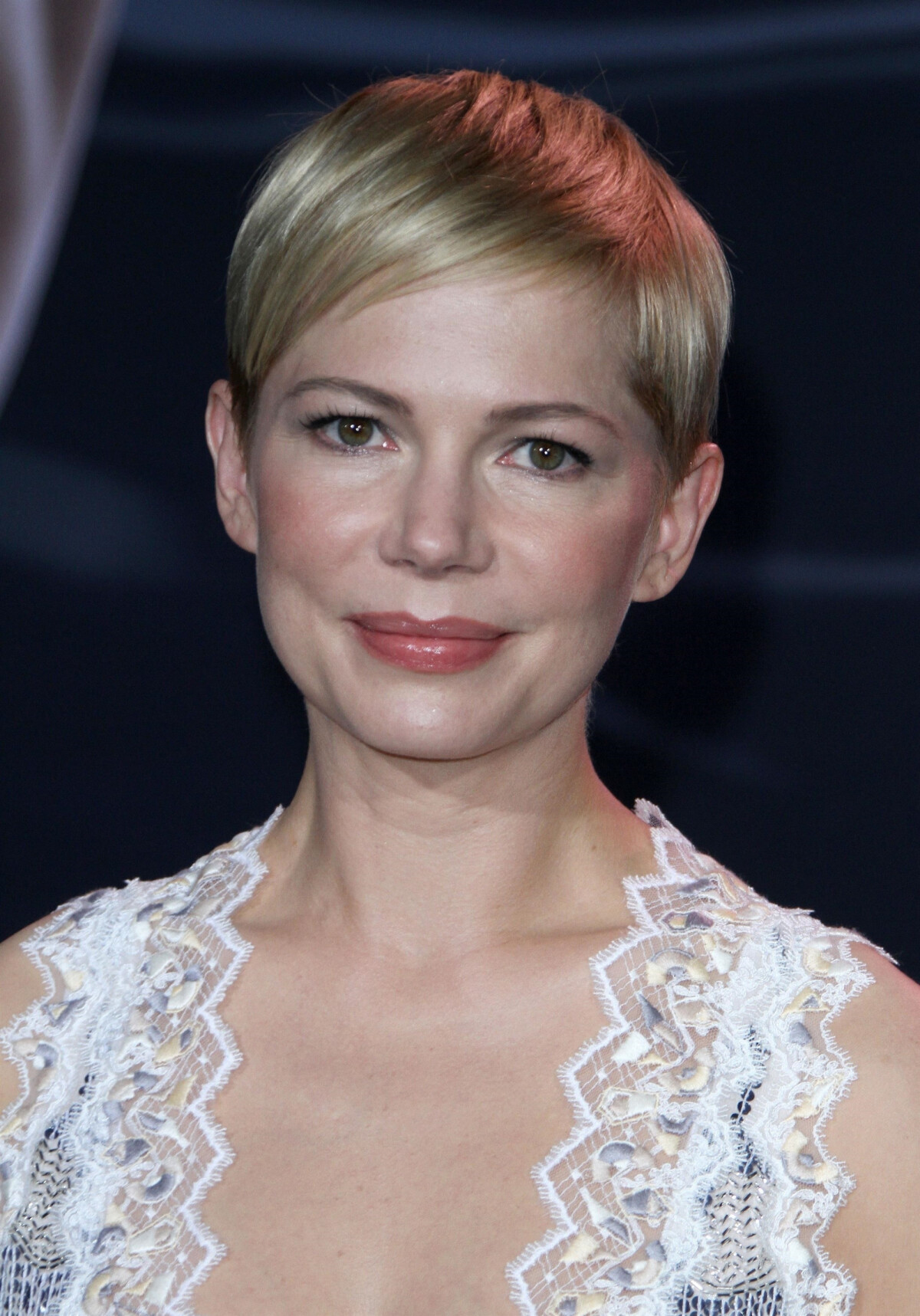 WESTWOOD, LOS ANGELES, CA, USA - OCTOBER 01: Actress Michelle Williams  wearing a Louis Vuitton dress arrives at the World Premiere Of Columbia  Pictures' 'Venom' held at the Regency Village Theater on