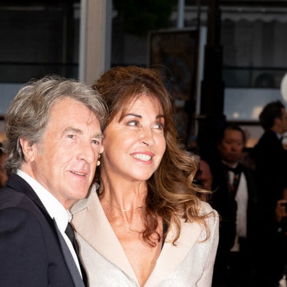 François Cluzet et sa femme Narjiss Slaoui-Falcoz - Montée des marches du film " Mascarade " lors du 75ème Festival International du Film de Cannes. Le 27 mai 2022 © Cyril Moreau / Bestimage 