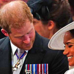 Le prince Harry, duc de Sussex, et Meghan Markle, duchesse de Sussex - Les membres de la famille royale et les invités lors de la messe célébrée à la cathédrale Saint-Paul de Londres, dans le cadre du jubilé de platine (70 ans de règne) de la reine Elisabeth II d'Angleterre. Londres, le 3 juin 2022. 