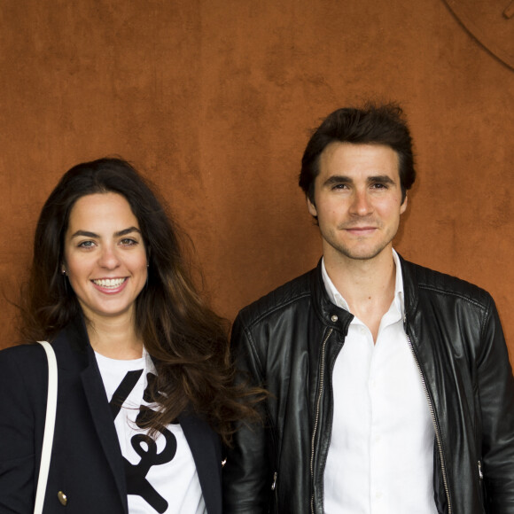 Anouchka Delon et son compagnon Julien Dereims dans le village des internationaux de France de tennis de Roland-Garros à Paris. ©JB Autissier / Panoramic / Bestimage 