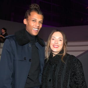 Info - Sortie le 4 mars de "Multitude" nouvel album de Stromae - Stromae (nouvelle coupe de cheveux) et sa femme Coralie Barbier au défilé "Victoria's Secret Paris 2016" au Grand Palais à Paris, le 30 novembre 2016. © Denis Guignebourg/Bestimage 