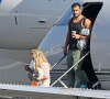 Exclusif - Britney Spears et son fiancé Sam Asghari arrivent en jet privé à Van Nuys, Los Angeles, Californie, Etats-Unis, le 7 décembre 2021, après avoir fêté le 40ème anniversaire de Britney à Cabo San Lucas au Mexique. 