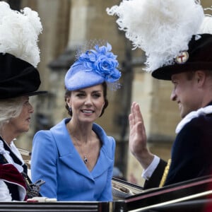 Le prince William, duc de Cambridge, et Catherine (Kate) Middleton, duchesse de Cambridge, le prince Charles, prince de Galles, et Camilla Parker Bowles, duchesse de Cornouailles, lors de la cérémonie de l'ordre de la Jarretière à la chapelle Saint-Georges du château de Windsor. Londres, le 13 juin 2022. 