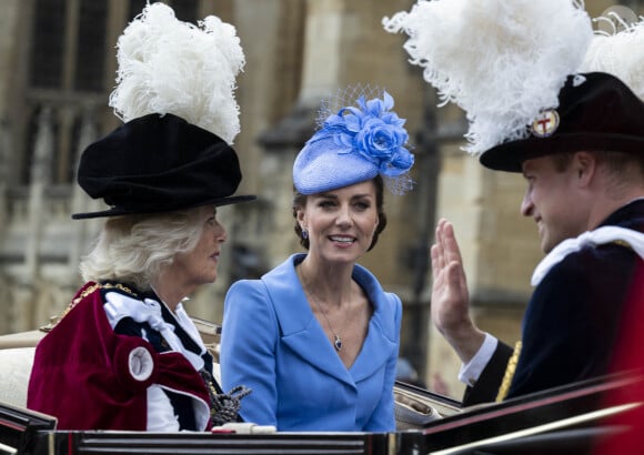 Le prince William, duc de Cambridge, et Catherine (Kate) Middleton, duchesse de Cambridge, le prince Charles, prince de Galles, et Camilla Parker Bowles, duchesse de Cornouailles, lors de la cérémonie de l'ordre de la Jarretière à la chapelle Saint-Georges du château de Windsor. Londres, le 13 juin 2022. 