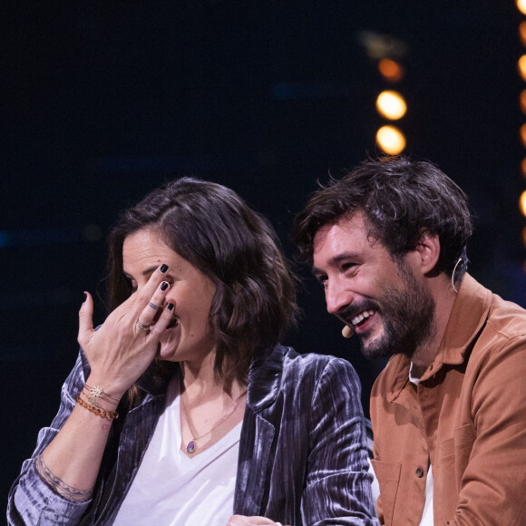 Exclusif - No Tabloids - Laure Manaudou et son mari Jérémy Frérot - Enregistrement de l'émission "La Chanson secrète 11" à Paris, diffusée le 24 juin sur TF1. Le 18 janvier 2022 Après le succès des précédentes éditions, « LA CHANSON SECRETE », présentée par N.Aliagas et produite par DMLS TV, revient sur TF1. 8 artistes ne savent rien de ce qui va se passer pour eux ! Ils ont accepté de jouer le jeu, de se laisser totalement surprendre, émouvoir, parfois même déstabiliser car ils vont découvrir en même temps que les téléspectateurs une surprise : une chanson qui leur est chère revisitée et réinterprétée par un artiste. Des mises en scène spectaculaires au service de l’émotion… Et des émotions fortes pour l’artiste assis dans le fauteuil grâce à la venue sur le plateau de proches et d’invités inattendus. Les téléspectateurs seront aux premières loges pour vivre ces moments d’intimité musicale rare. Dans ce nouveau numéro, un couple rare en télévision, un chef étoilé, un invité piégé venu pour répéter une surprise à un autre guest sans s'attendre à être lui-même invité dans le fauteuil, des participants exceptionnels tels que le frère d'un guest pour la première fois en France... © Cyril Moreau / Bestimage  Exclusive - No Web No Blog pour Belgique et Suisse 