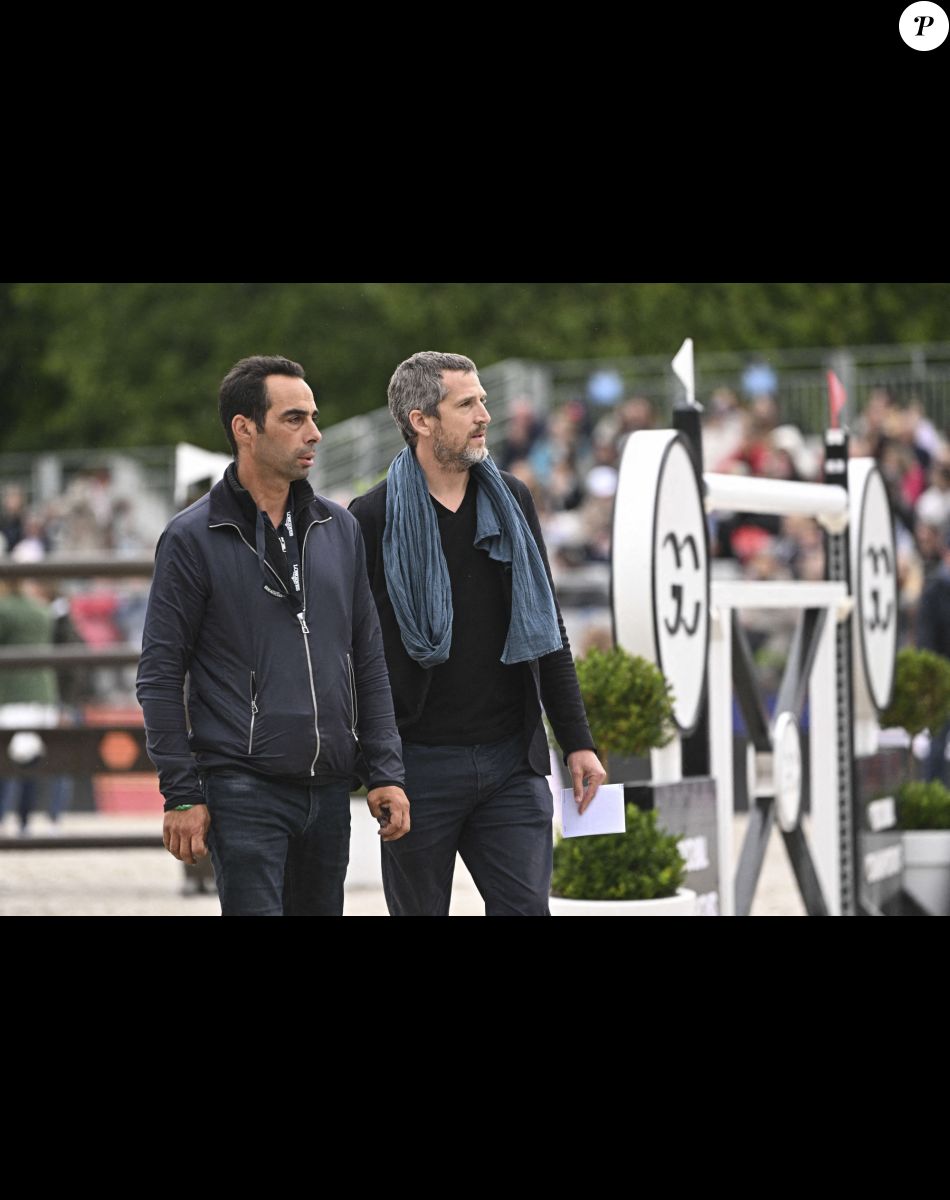 Guillaume Canet lors de la 8ème édition du "Longines Paris Eiffel Jumping" au Champ de Mars à Paris, le 25 juin 2022.