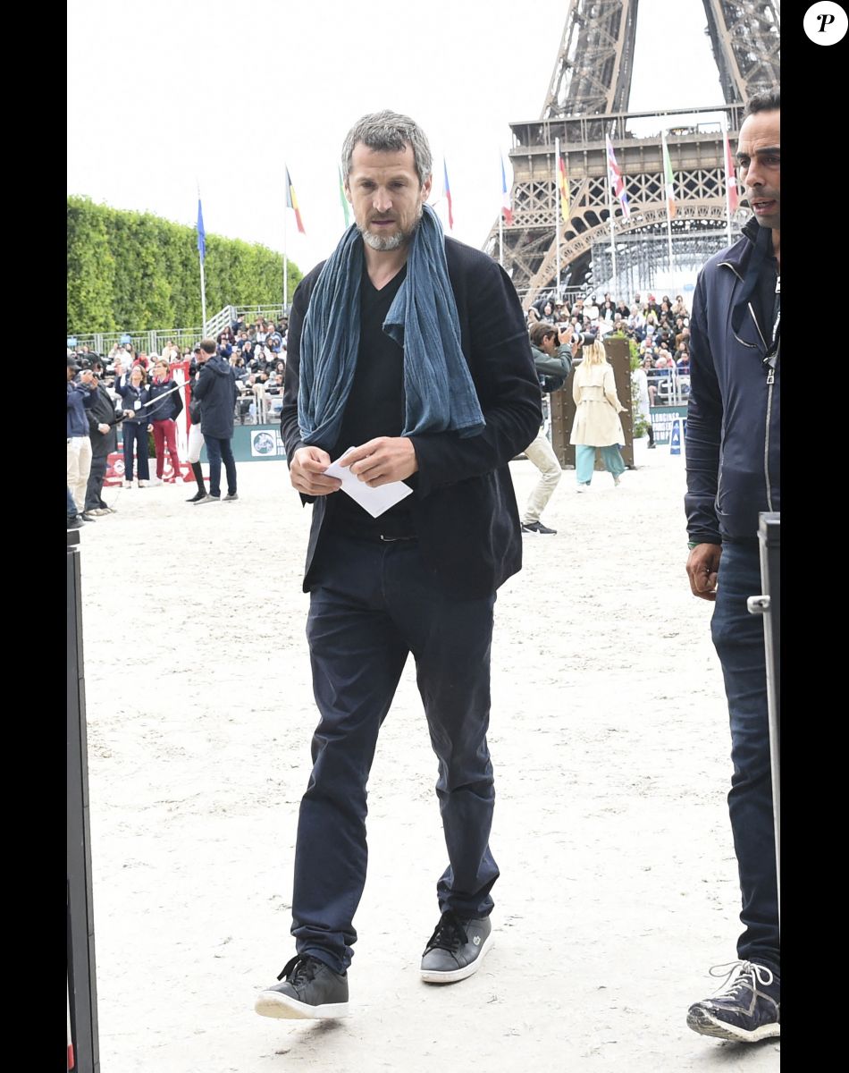 Guillaume Canet lors de la 8ème édition du "Longines Paris Eiffel Jumping" au Champ de Mars à Paris, le 25 juin 2022.