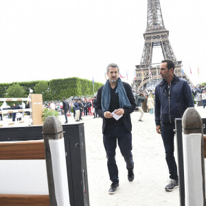 Guillaume Canet lors de la 8ème édition du "Longines Paris Eiffel Jumping" au Champ de Mars à Paris, le 25 juin 2022.