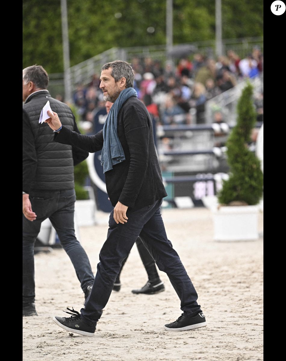 Guillaume Canet lors de la 8ème édition du "Longines Paris Eiffel Jumping" au Champ de Mars à Paris, le 25 juin 2022.