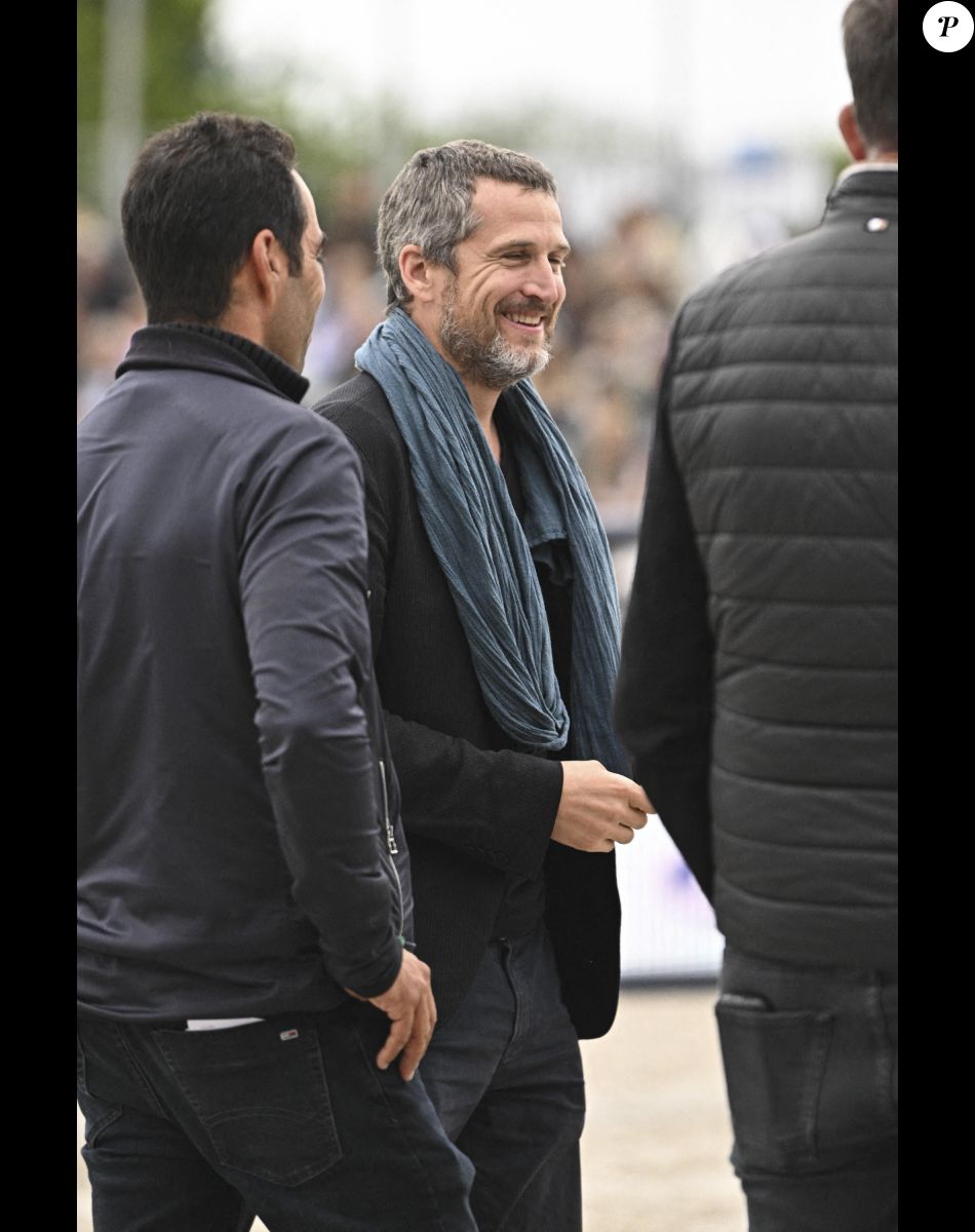 Guillaume Canet lors de la 8ème édition du "Longines Paris Eiffel Jumping" au Champ de Mars à Paris, le 25 juin 2022.