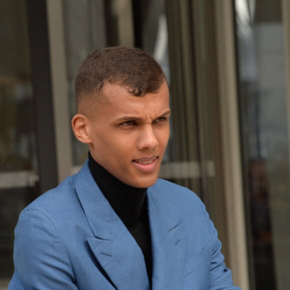 Stromae - People à la sortie du défilé de mode "Louis Vuitton", collection prêt-à-porter automne-hiver 2015/2016, à Paris. Le 11 mars 2015 