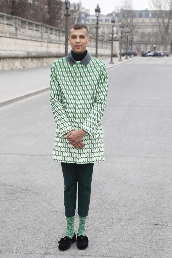 Stromae Défilé de mode prêt-à-porter Automne Hiver 2015, 2016. Valentino dans les jardins des Tuileries à Paris. Le Mardi 10 Mars 2015