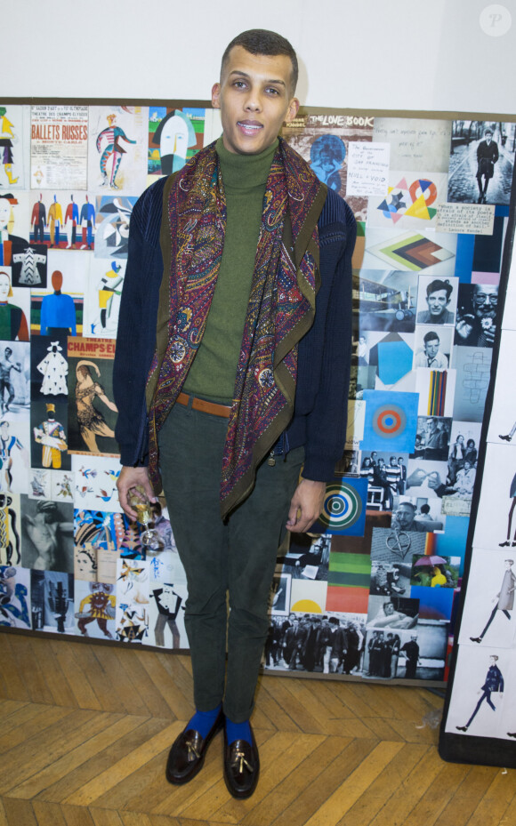 Le chanteur Stromae - People au défilé de mode hommes Valentino collection prêt-à-porter Automne Hiver 2015/2016 à l'hôtel Salomon de Rothschild à Paris, le 21 janvier 2015 