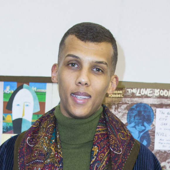 Le chanteur Stromae - People au défilé de mode hommes Valentino collection prêt-à-porter Automne Hiver 2015/2016 à l'hôtel Salomon de Rothschild à Paris, le 21 janvier 2015 