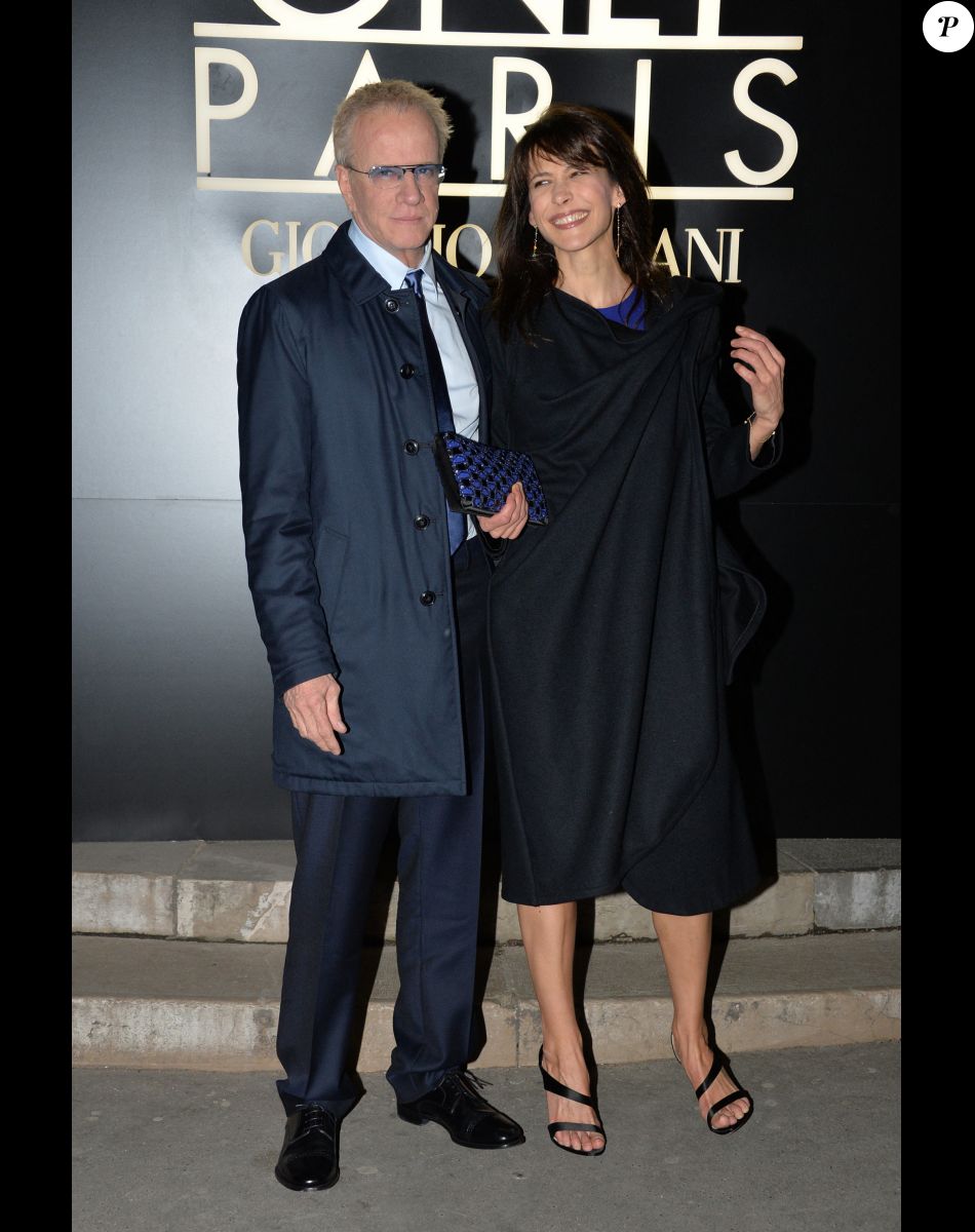 Sophie Marceau et son compagnon Christophe Lambert - Arrivee des people au defile Giorgio Armani Haute Couture Printemps/Ete au Palais de Tokyo à Paris.