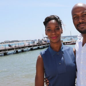 Harry Roselmack et sa femme Chrislaine - Rencontres sur la plage Nice Matin - Majestic Barrière lors du 67ème festival international du film de Cannes. Le 21 mai 2014