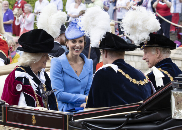 Le prince William, duc de Cambridge, et Catherine (Kate) Middleton, duchesse de Cambridge, le prince Charles, prince de Galles, et Camilla Parker Bowles, duchesse de Cornouailles, lors de la cérémonie de l'ordre de la Jarretière à la chapelle Saint-Georges du château de Windsor. Londres, la 13 juin 2022. 