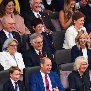 Kate Catherine Middleton, duchesse de Cambridge, la princesse Charlotte, le prince George, le prince William, duc de Cambridge, Camilla Parker Bowles, duchesse de Cornouailles, le prince Charles - People au concert du jubilé de platine de la reine d'Angleterre au palais de Buckingham à Londres. Le 4 juin 2022 