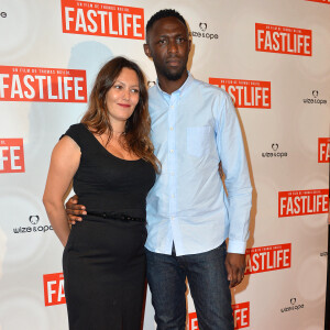 Thomas Ngijol et sa compagne Karole Rocher - Avant-première du film "Fastlife" au cinéma Gaumont Capucines Opéra à Paris, le 15 juillet 2014.